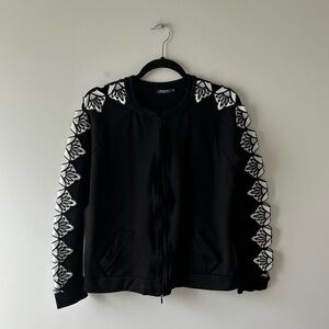 Anne Fontaine Black Jacket with White Floral Sleeve Appliqué